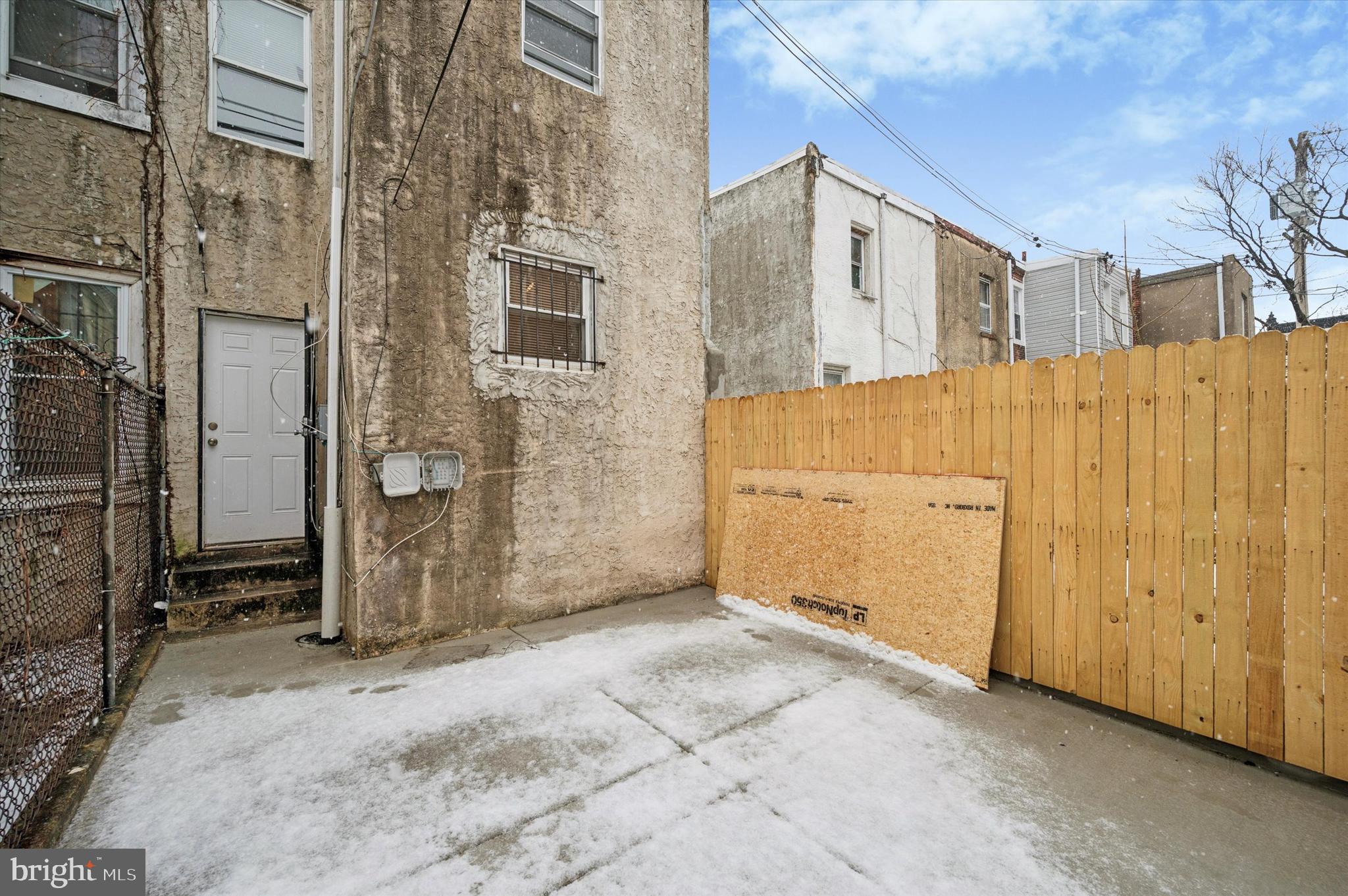 2457 North Patton Street Philadelphia, PA 19132 - Photo 23 of 23 a view of a blue house with a outdoor space