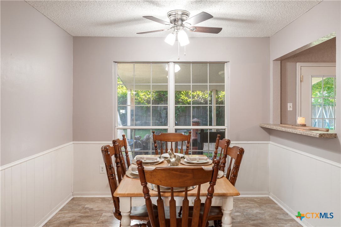 144 Jordan Loop Nolanville, TX 76559 - Photo 15 of 20 a view of a dining room with furniture window and outside view