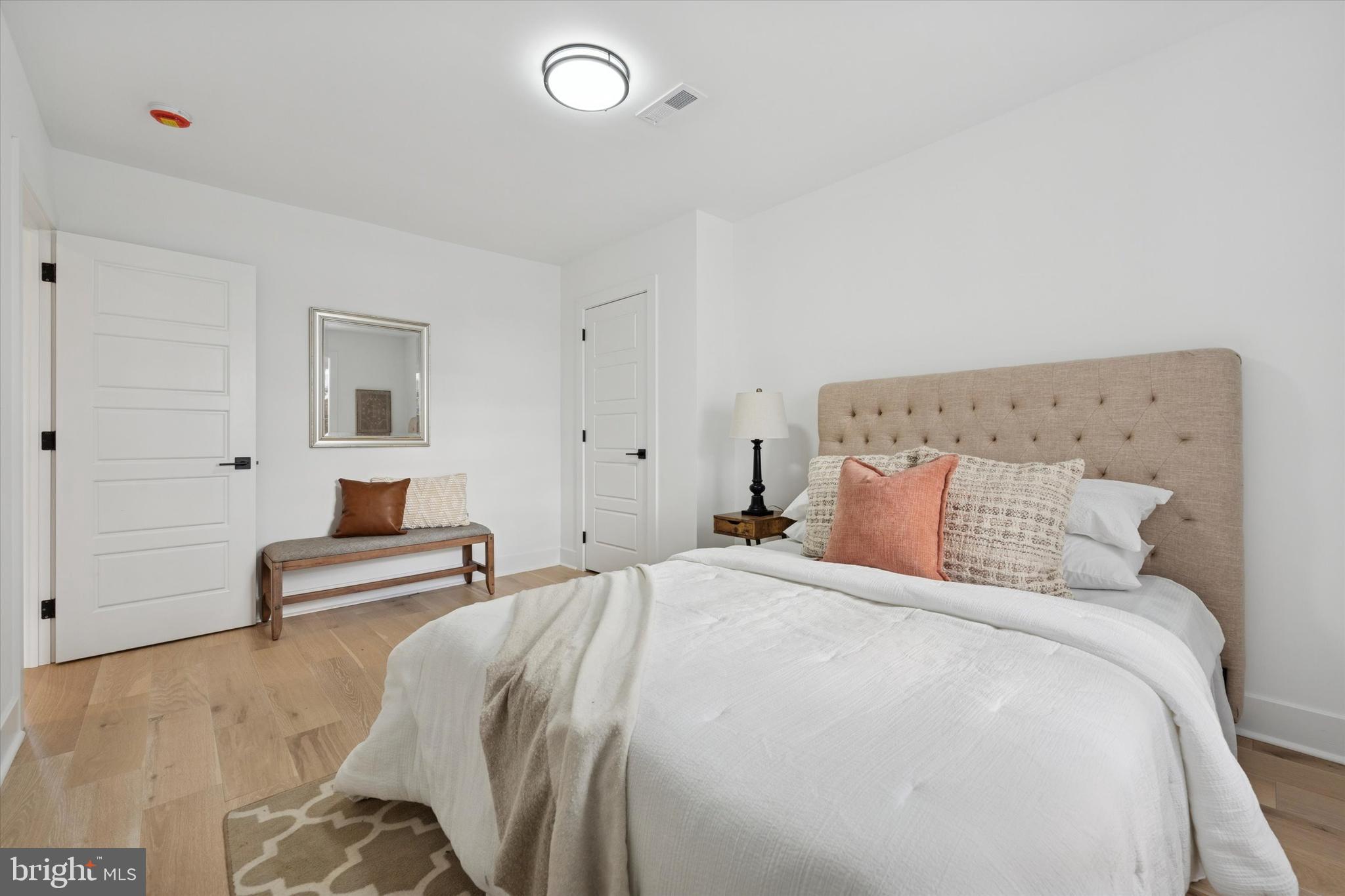 409 Martin Street Philadelphia, PA 19128 - Photo 10 of 20 a bed room with a bed and furniture