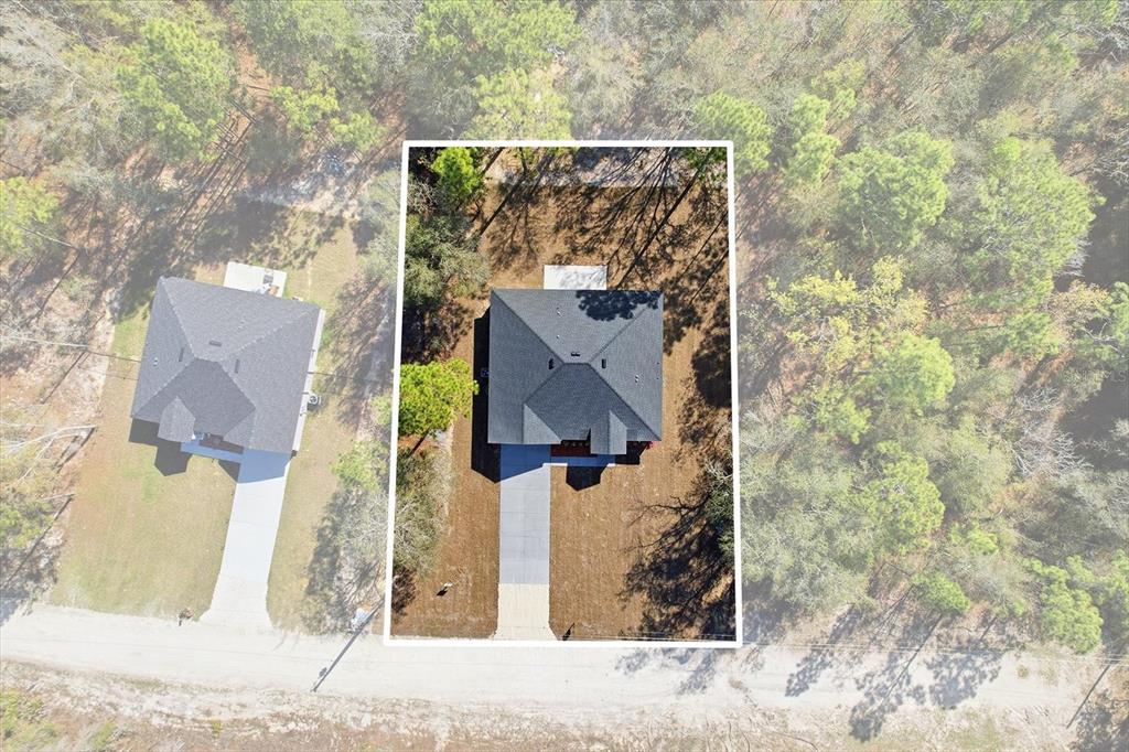 13418 Cormorant Road Weeki Wachee, FL 34614 - Photo 2 of 46 front view of a house with a street