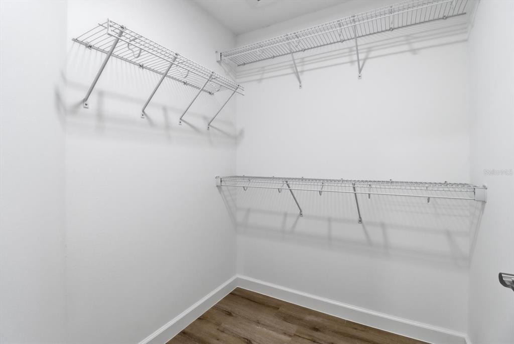 13418 Cormorant Road Weeki Wachee, FL 34614 - Photo 33 of 46 a view of a room with racks on the wall