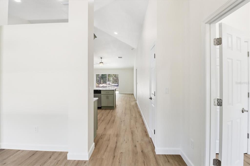 13418 Cormorant Road Weeki Wachee, FL 34614 - Photo 8 of 46 a view of a kitchen from the hallway