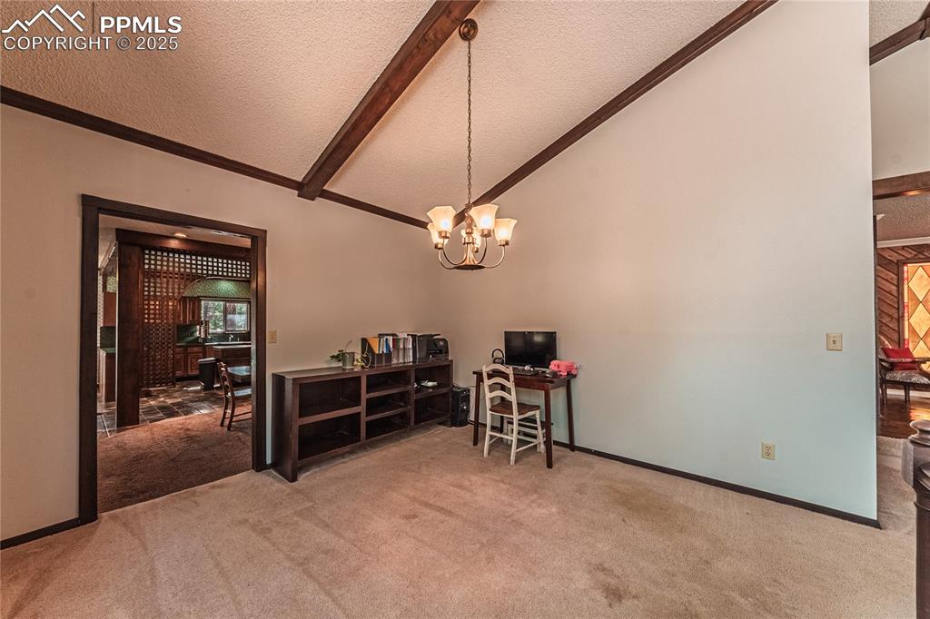 7190 Burgess Road Colorado Springs, CO 80908 - Photo 12 of 50 a view of a livingroom with furniture and furniture