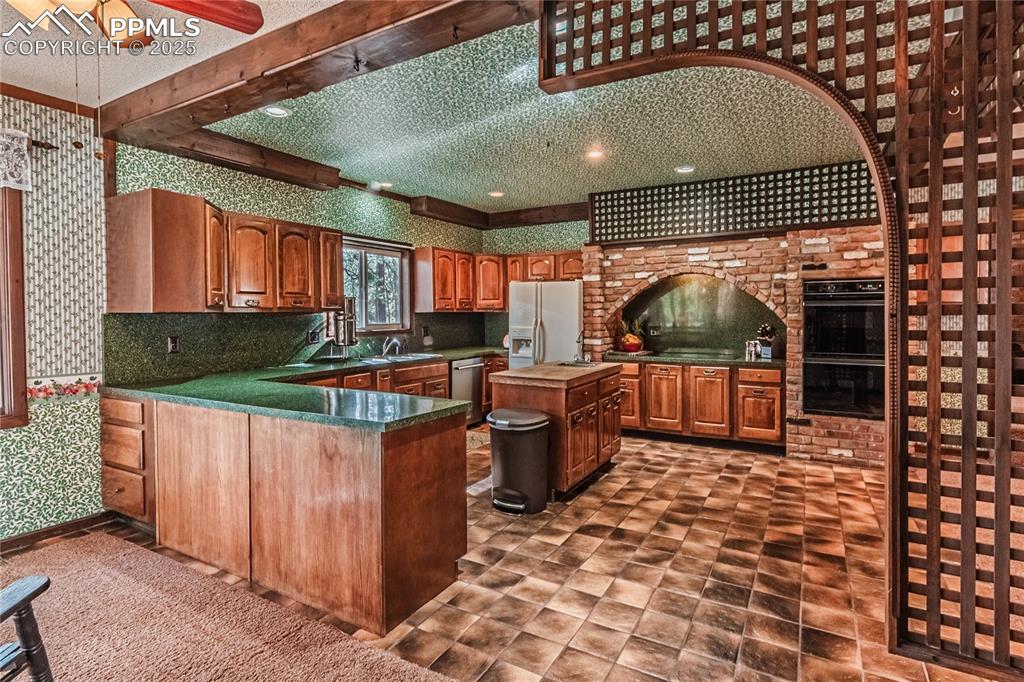 7190 Burgess Road Colorado Springs, CO 80908 - Photo 22 of 50 a view of a storage & utility room