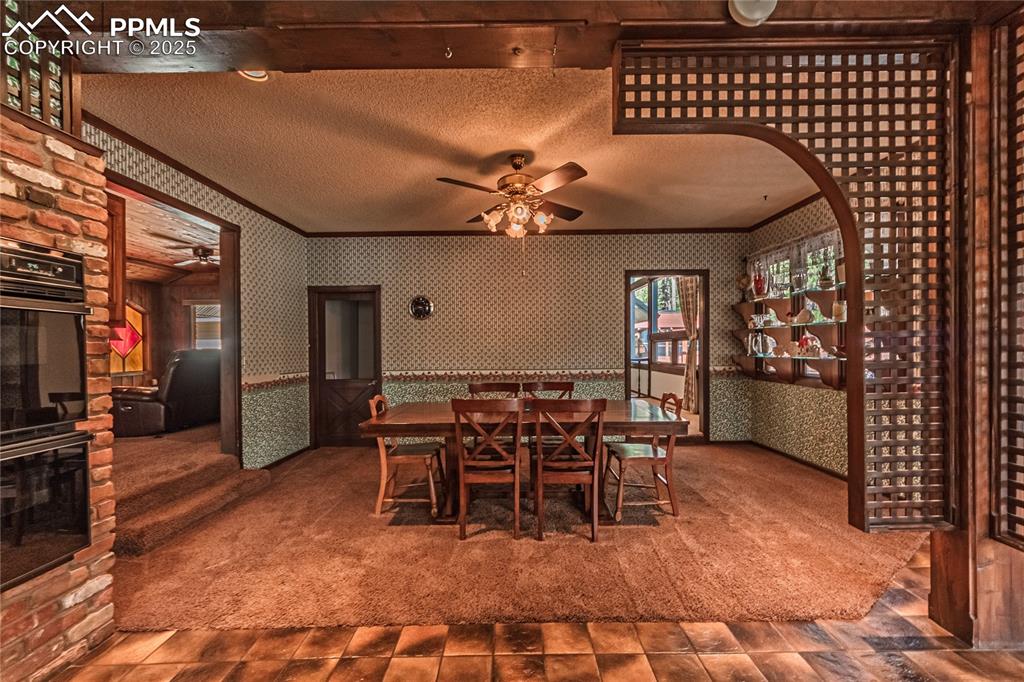 7190 Burgess Road Colorado Springs, CO 80908 - Photo 26 of 50 a view of a chairs and table in the patio