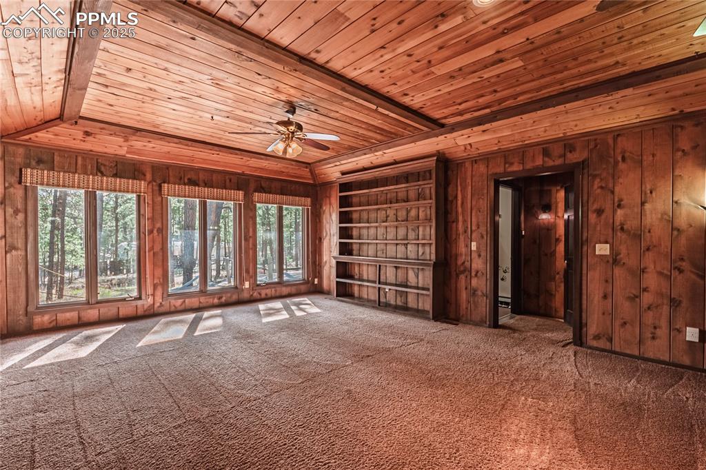 7190 Burgess Road Colorado Springs, CO 80908 - Photo 27 of 50 a view of an empty room with a balcony