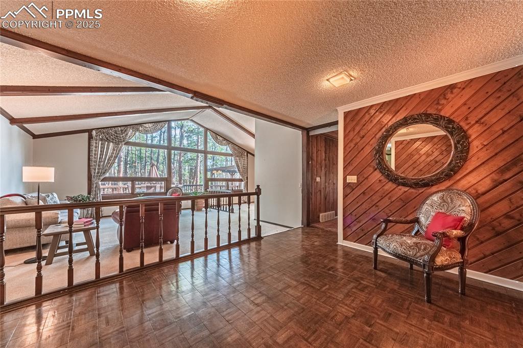7190 Burgess Road Colorado Springs, CO 80908 - Photo 5 of 50 a living room with furniture and a large window