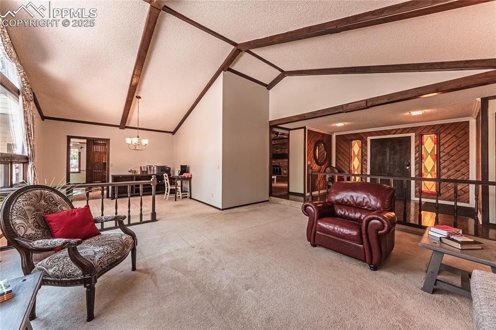 7190 Burgess Road Colorado Springs, CO 80908 - Photo 10 of 50 a living room with furniture and a window