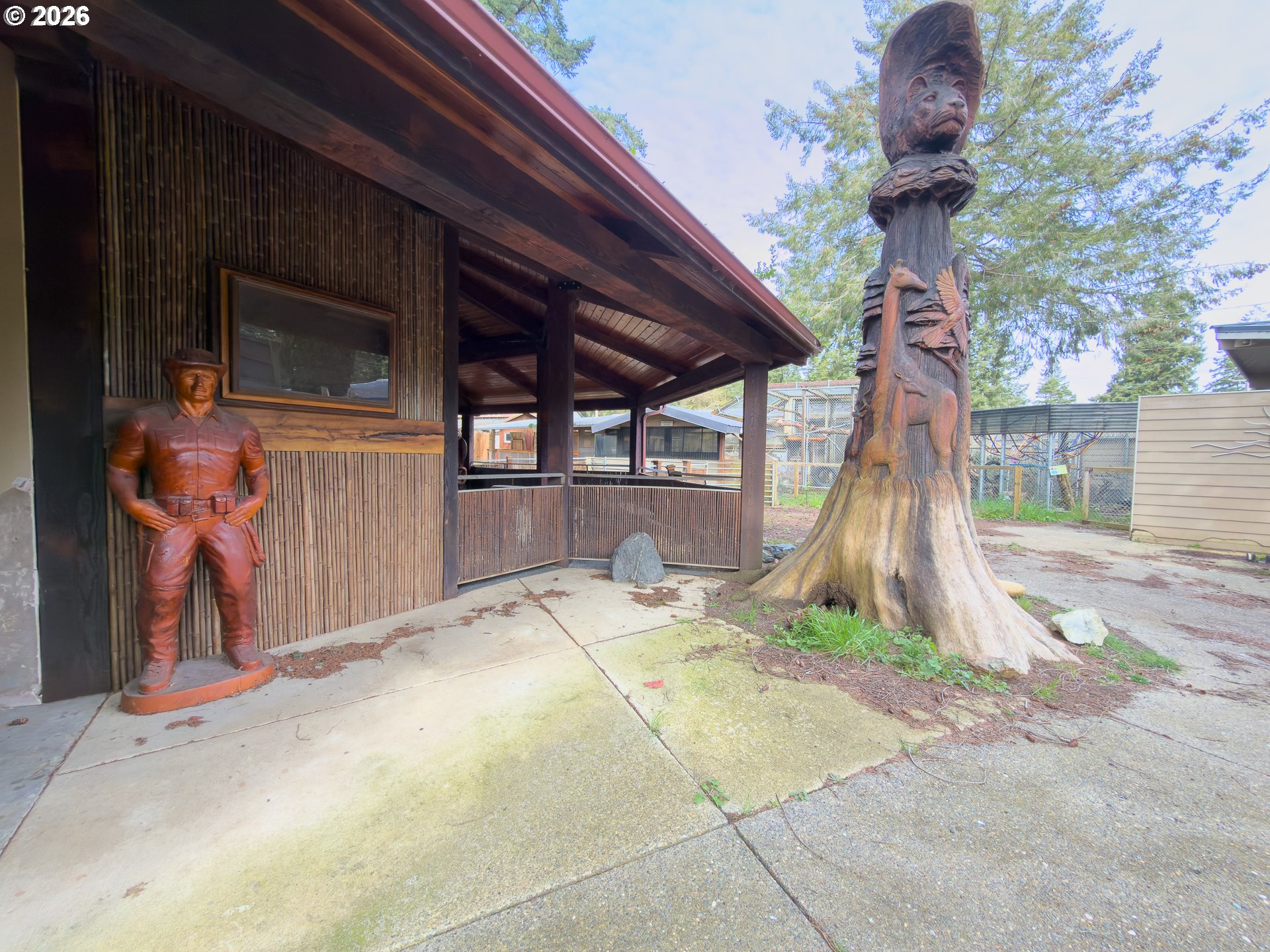 46914 Highway 101 Bandon, OR 97411 - Photo 14 of 48 a backyard of a house with seating space