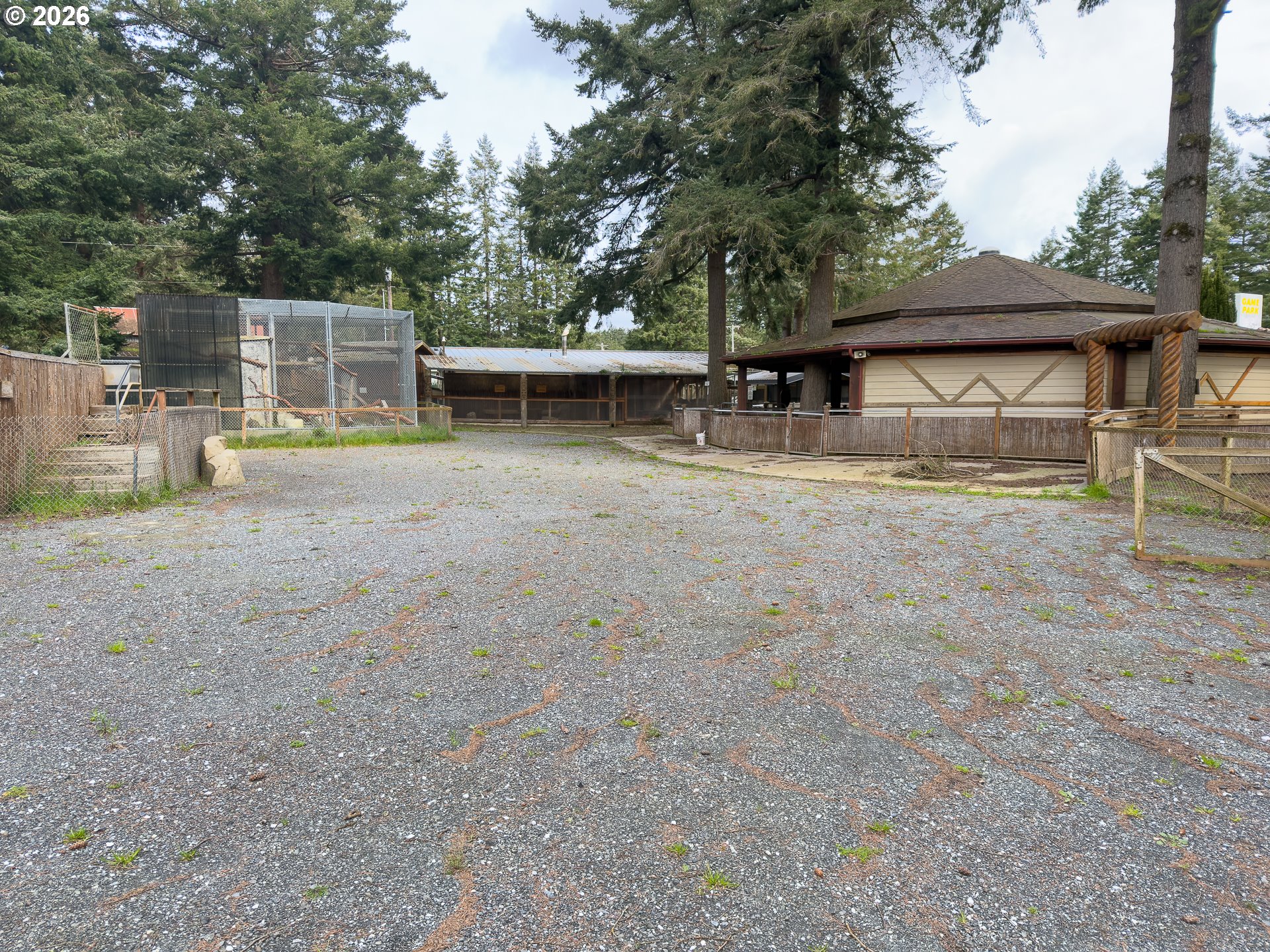 46914 Highway 101 Bandon, OR 97411 - Photo 19 of 48 a view of a house with backyard and sitting area