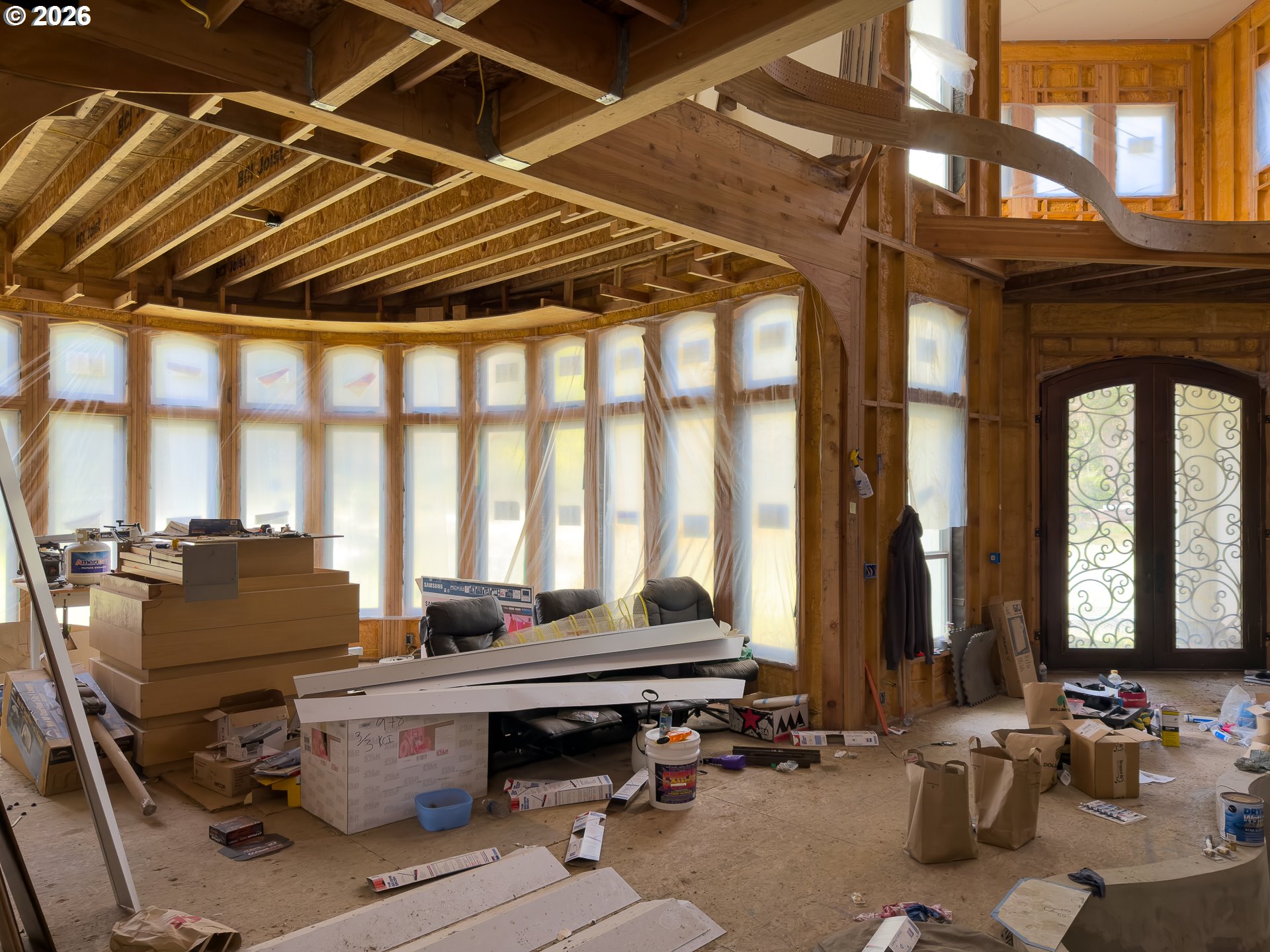 46914 Highway 101 Bandon, OR 97411 - Photo 42 of 48 a room with gym equipment and large windows