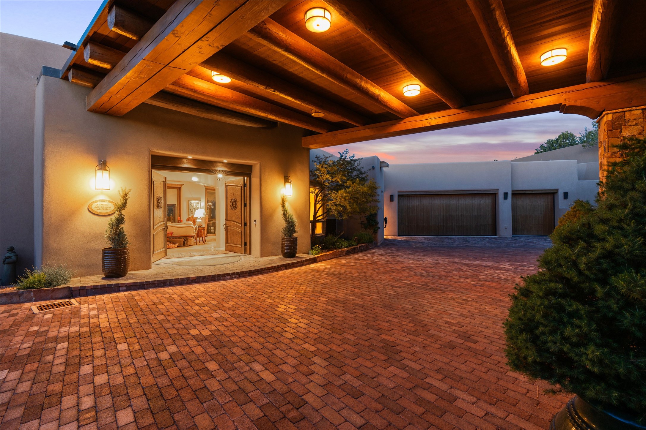 42 San Juan Ranch Road Santa Fe, NM 87506 - Photo 8 of 49 Welcoming Covered Portal with Hand-carved double wood doors