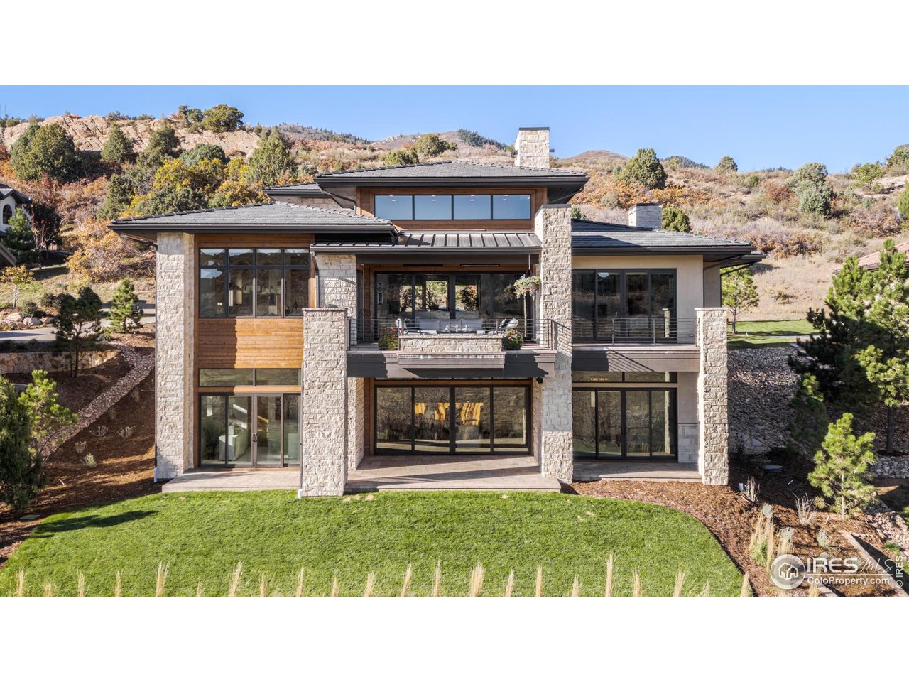 7572 Raphael Lane Littleton, CO 80125 - Photo 44 of 50 Embraced by open space in front and behind, the home achieves a rare balance of privacy and panorama-its setting both peaceful and expansive.