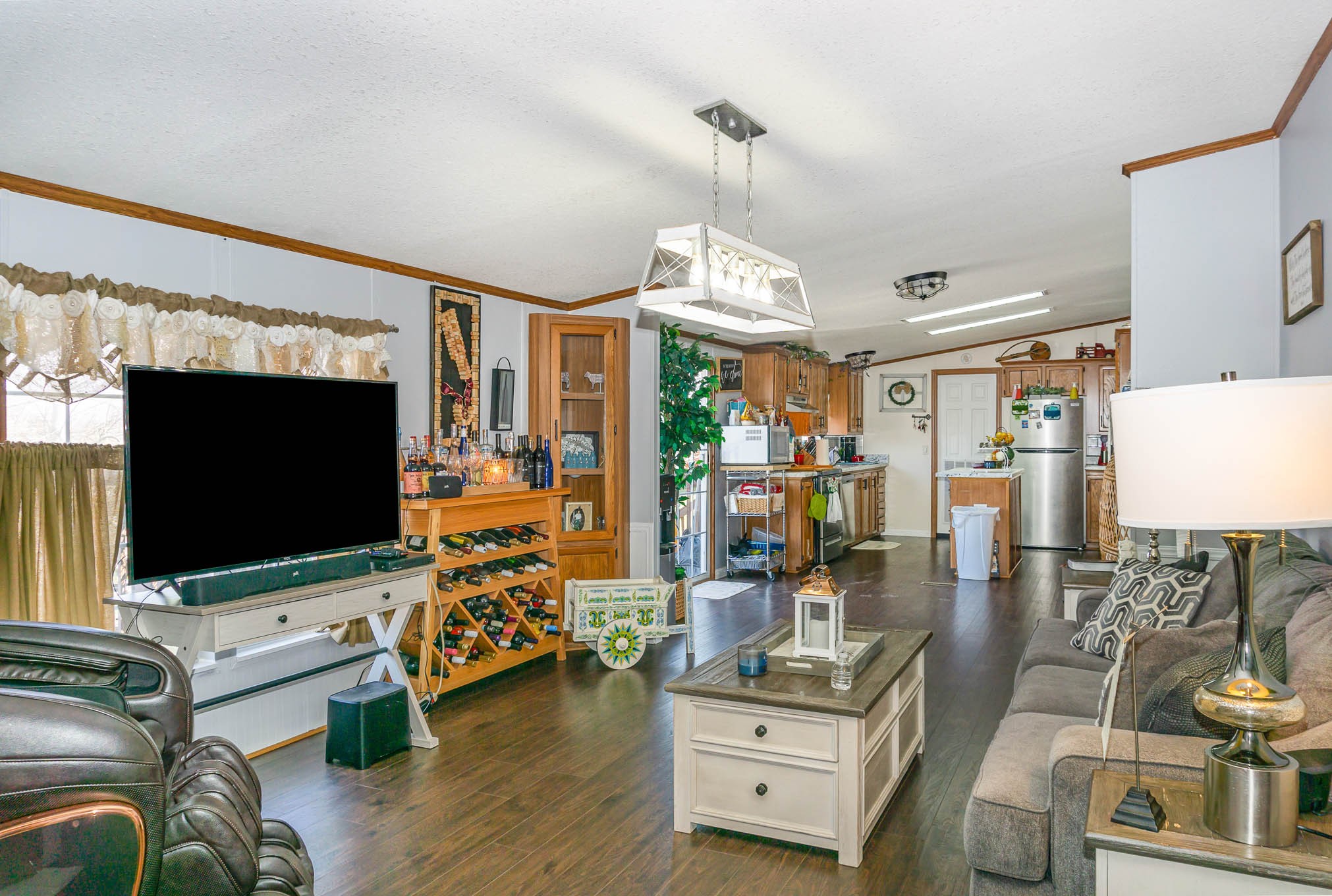 6104 Fulton Road Springfield, TN 37172 - Photo 4 of 30 a living room with furniture and a flat screen tv