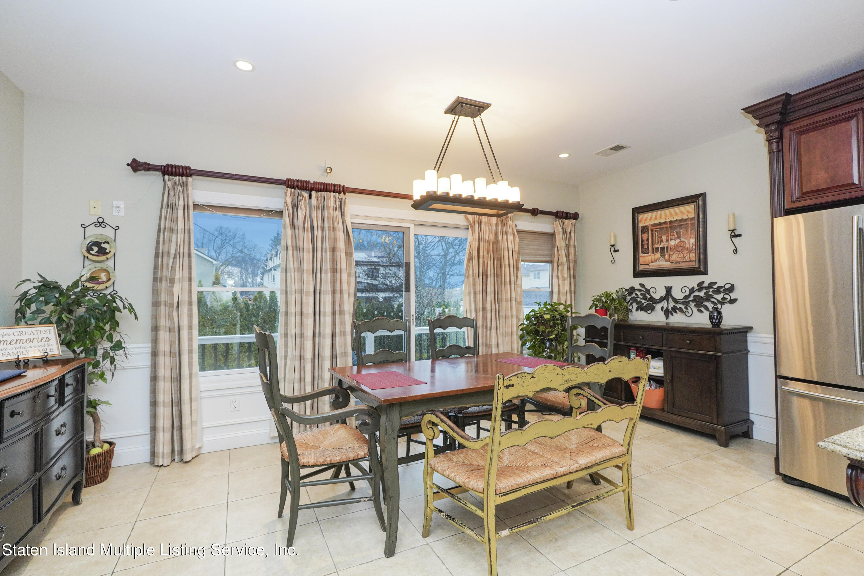 20 Kenneth Place Staten Island, NY 10309 - Photo 21 of 52 a dining room with furniture and window
