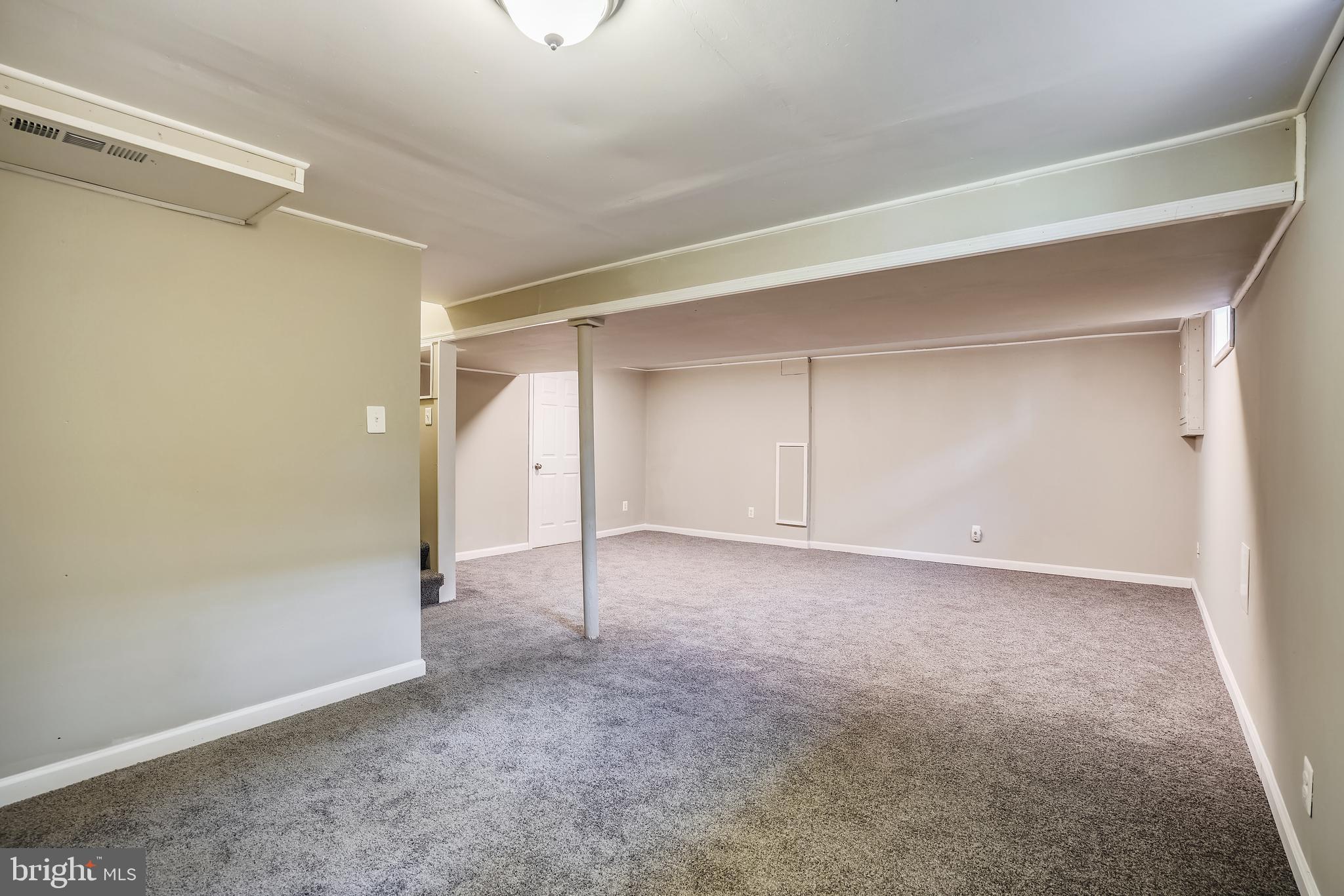 905 Kerwin Road Silver Spring, MD 20901 - Photo 21 of 47 The recreation room is L shaped w/brand new carpet