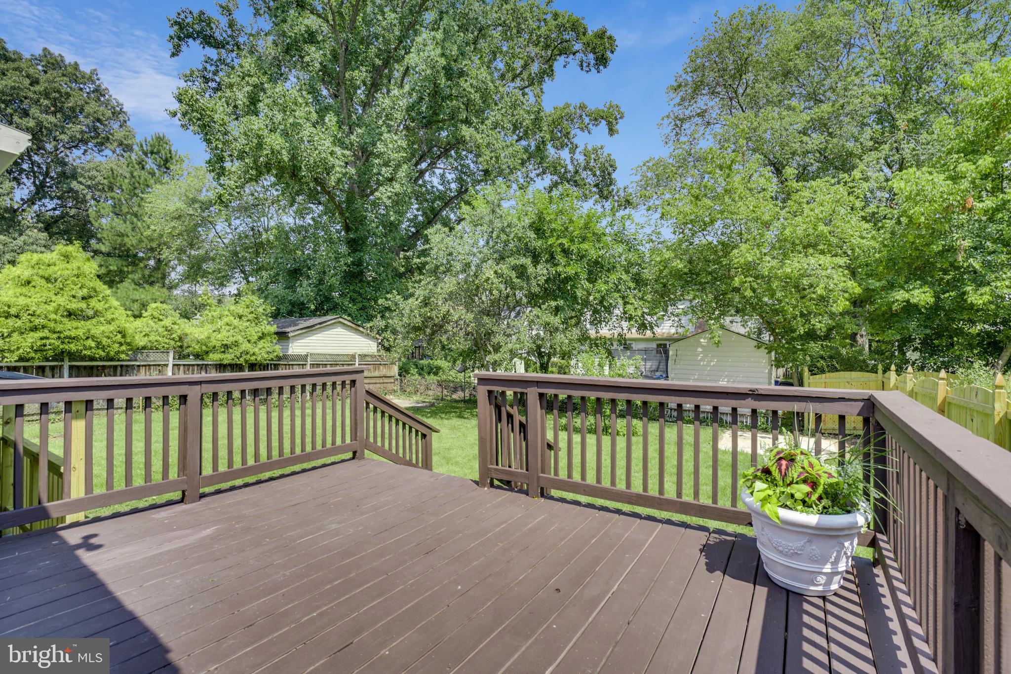 905 Kerwin Road Silver Spring, MD 20901 - Photo 27 of 47 The newly re-boarded and re-painted wooden deck