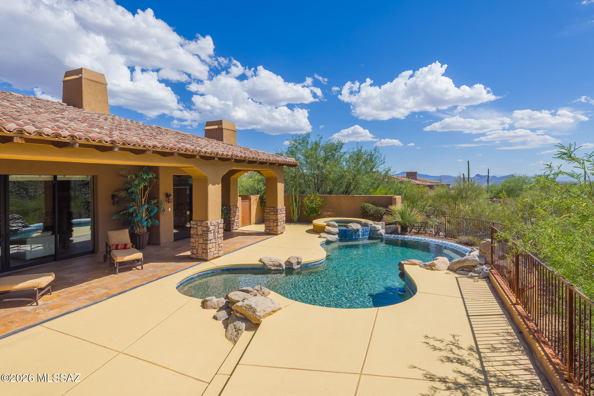 14225 North Rocking Ridge Court Marana, AZ 85658 - Photo 43 of 51 Pool with covered patio