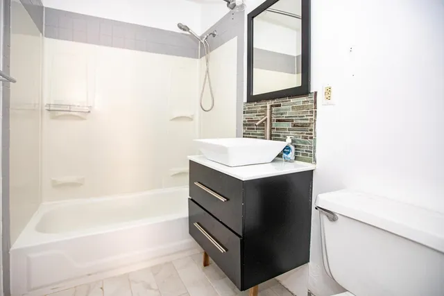 a close up of a bathtub