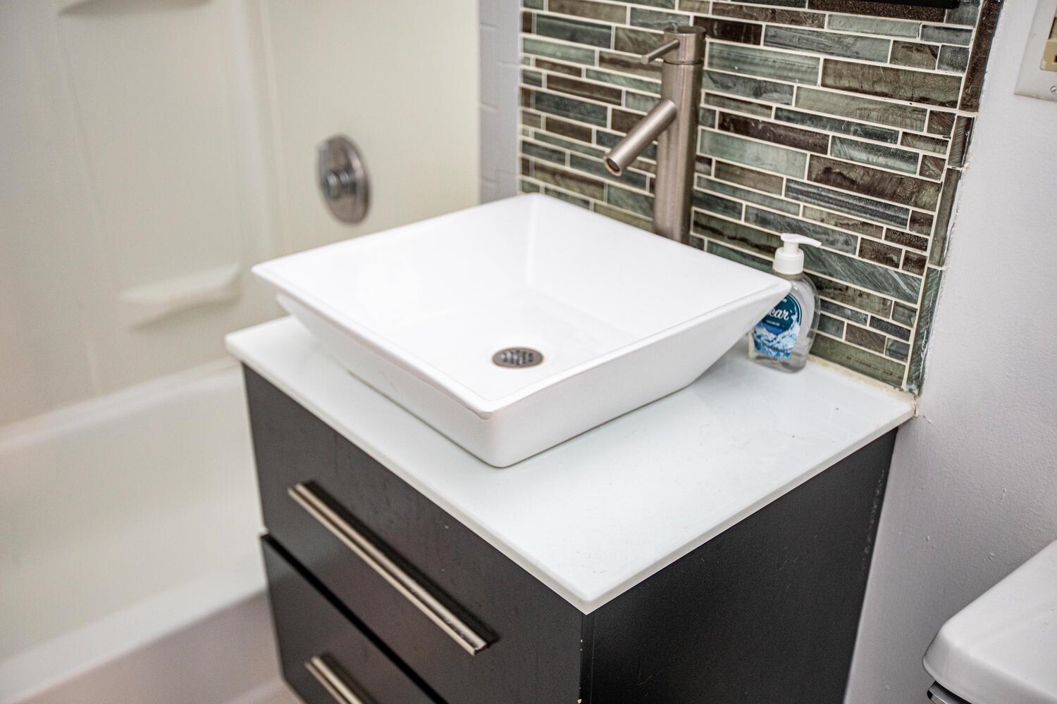 341 Monmouth Street, Unit 203D Jersey City, NJ 07302 - Photo 14 of 23 a close up of a sink