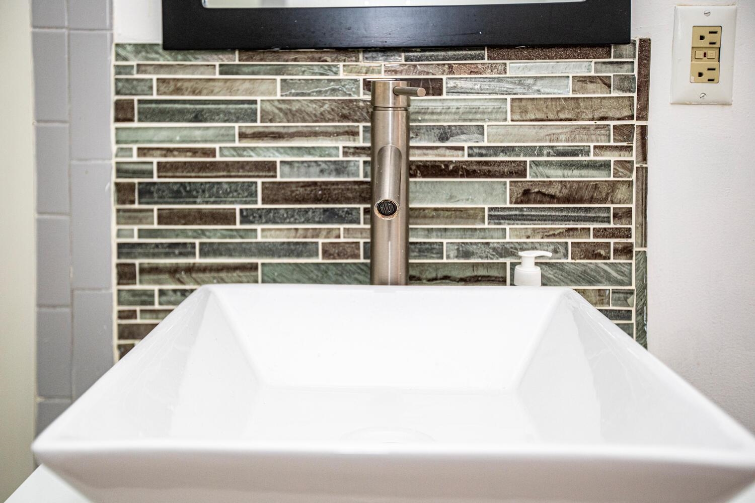 341 Monmouth Street, Unit 203D Jersey City, NJ 07302 - Photo 15 of 23 a close up of a bathtub