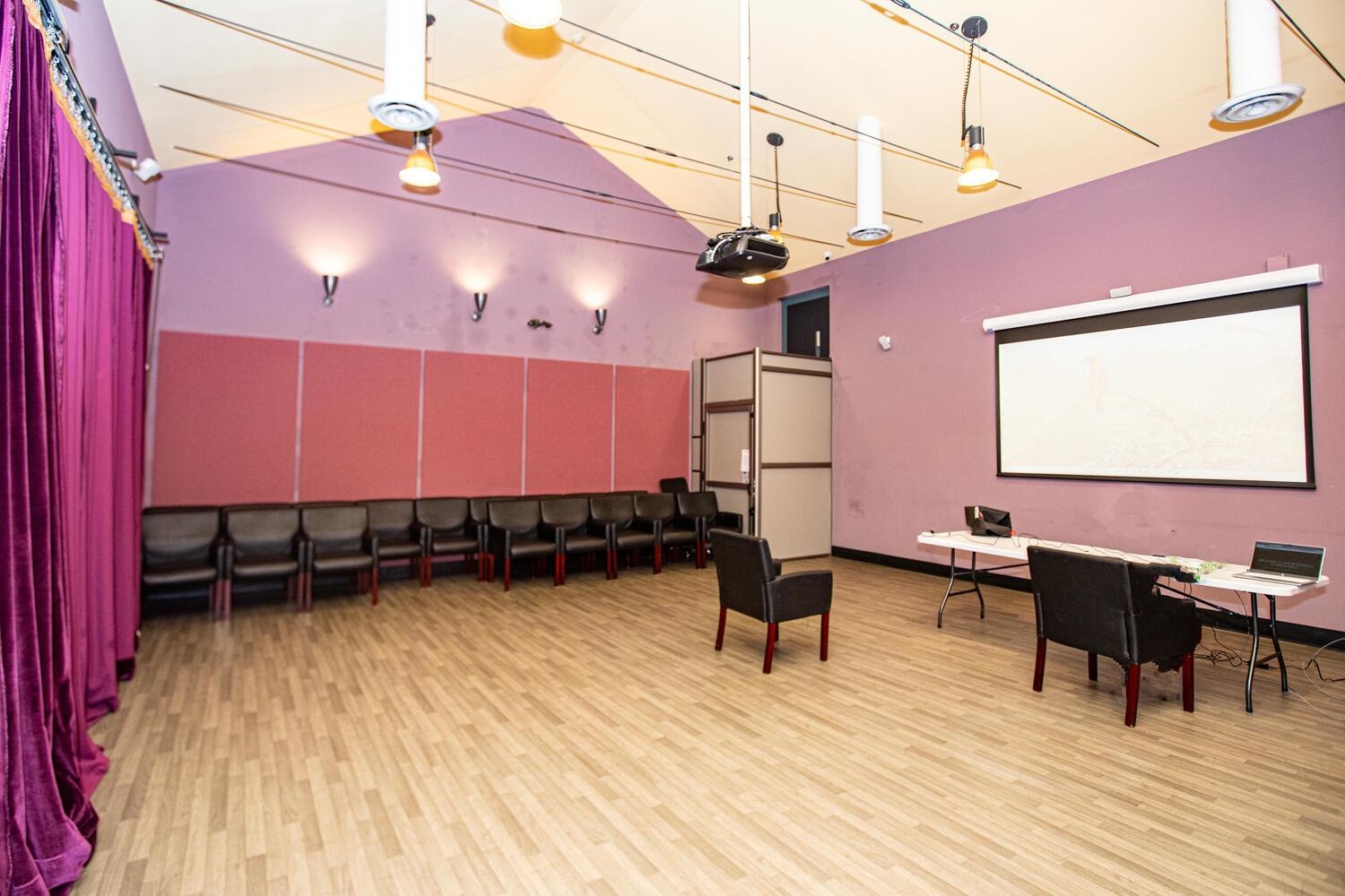 341 Monmouth Street, Unit 203D Jersey City, NJ 07302 - Photo 18 of 23 a room with lots of wooden furniture and windows