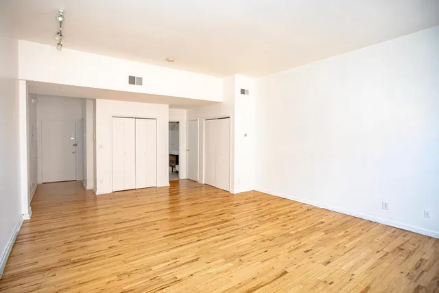a bathroom with a sink a toilet and a bathtub