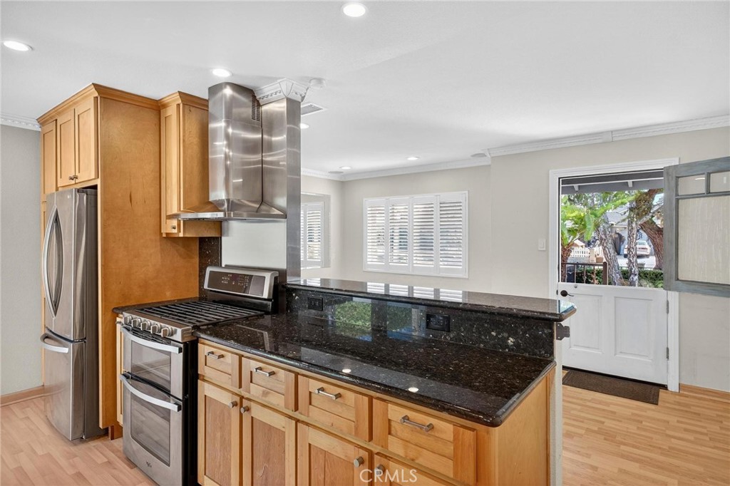 2519 Ralston Lane Redondo Beach, CA 90278 - Photo 12 of 69 a kitchen with granite countertop a sink stainless steel appliances and window