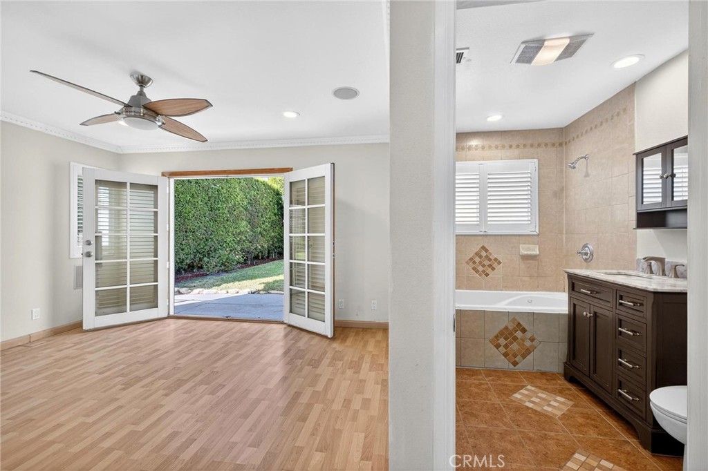 2519 Ralston Lane Redondo Beach, CA 90278 - Photo 16 of 69 a view of a kitchen with a sink and dishwasher with wooden floor