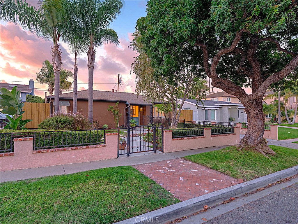2519 Ralston Lane Redondo Beach, CA 90278 - Photo 3 of 69 a front view of a house with a garden and yard