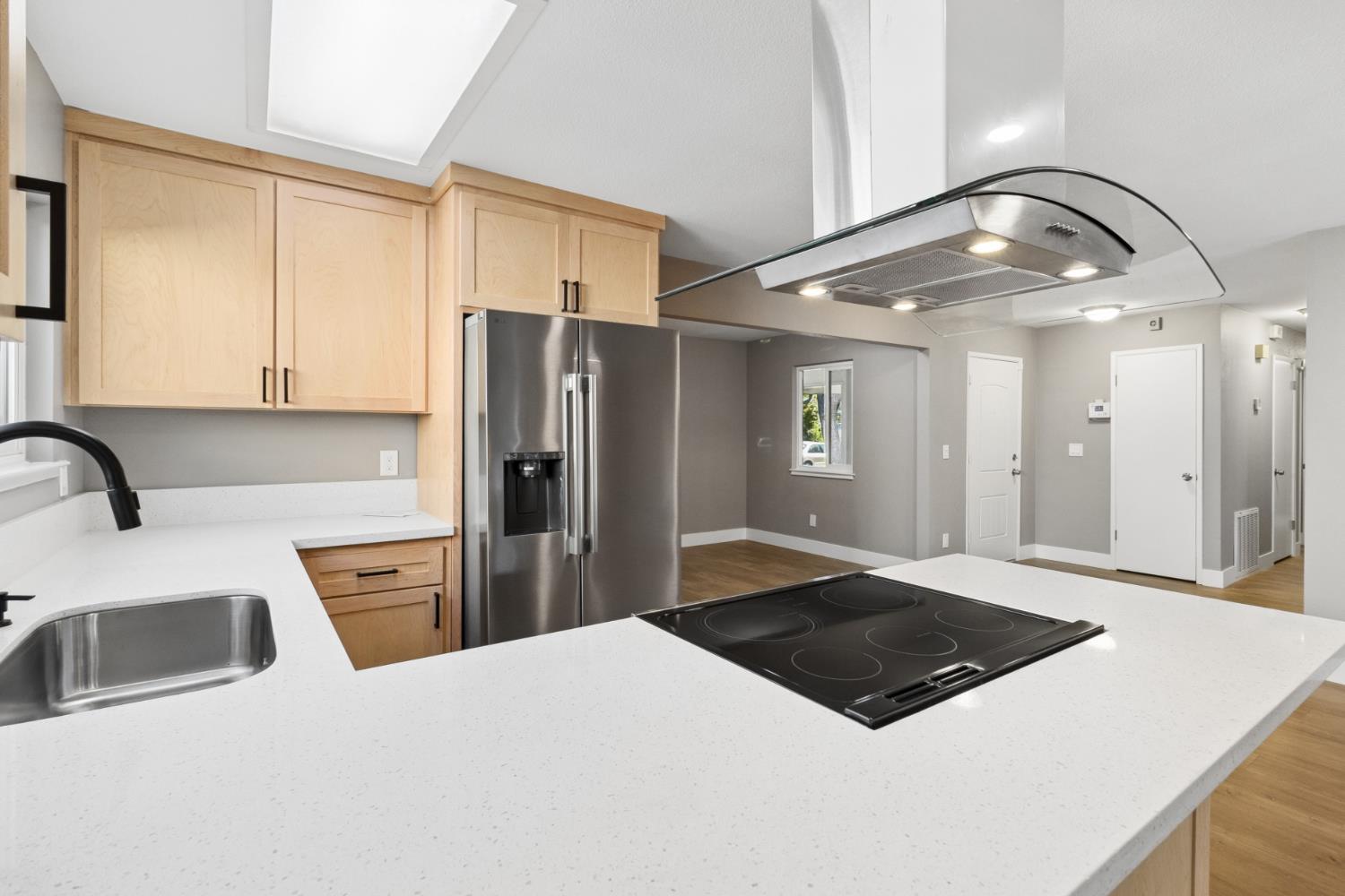 7249 Windjammer Way Citrus Heights, CA 95621 - Photo 12 of 41 a kitchen with stainless steel appliances a refrigerator a sink a stove and oven