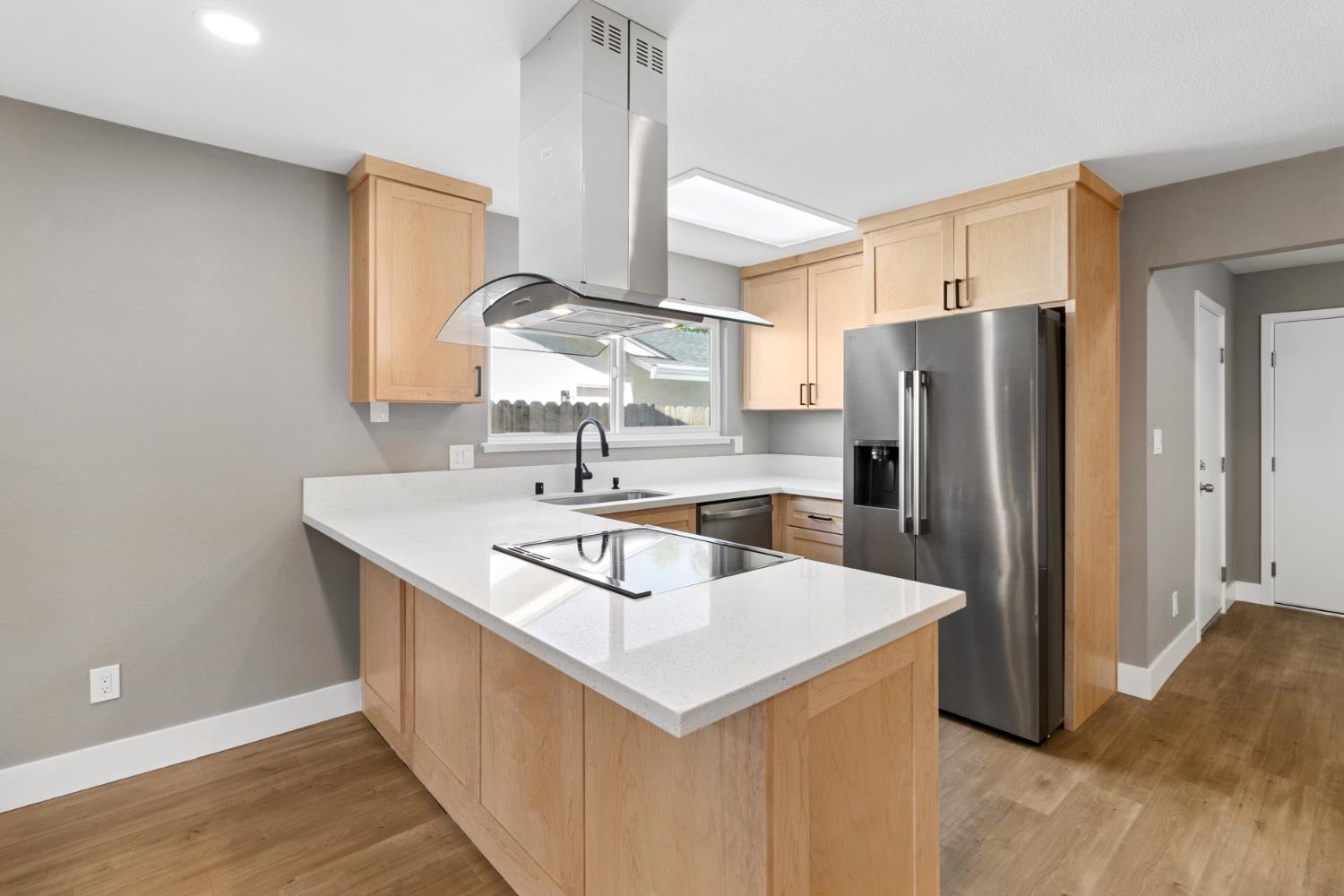 7249 Windjammer Way Citrus Heights, CA 95621 - Photo 13 of 41 a kitchen with stainless steel appliances a sink and a refrigerator