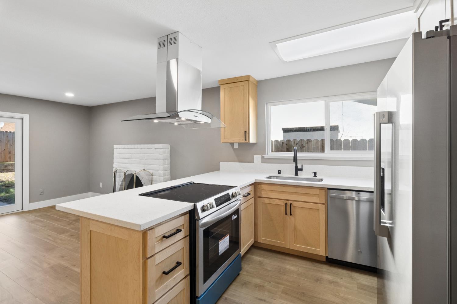 7249 Windjammer Way Citrus Heights, CA 95621 - Photo 16 of 41 a kitchen with a sink stove and cabinets