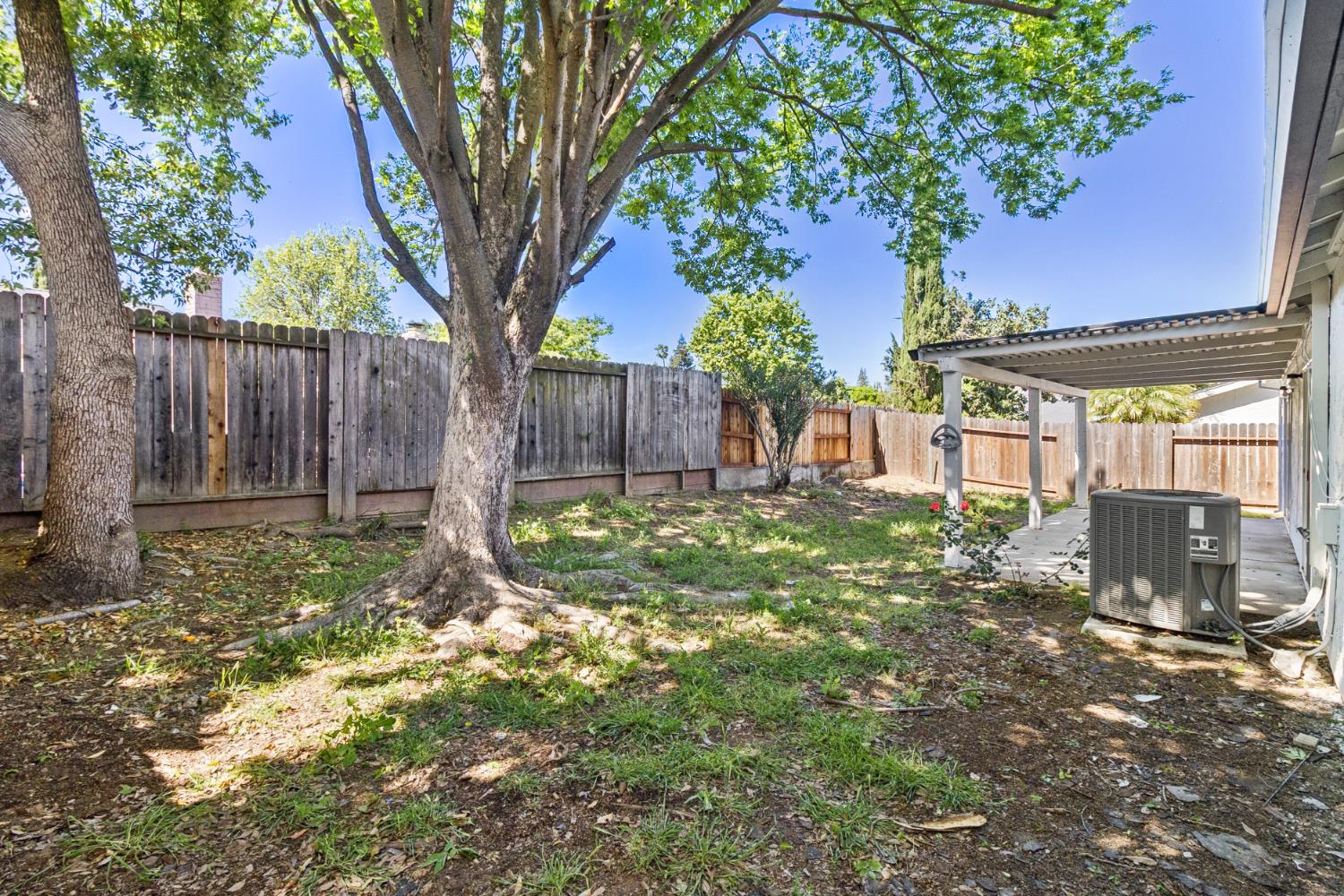 7249 Windjammer Way Citrus Heights, CA 95621 - Photo 38 of 41 a backyard of a house with lots of green space