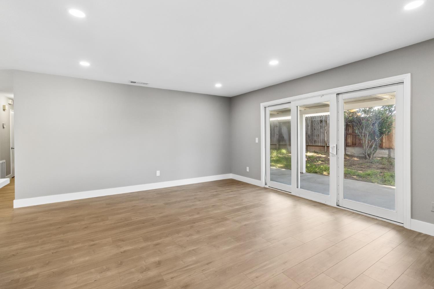7249 Windjammer Way Citrus Heights, CA 95621 - Photo 5 of 41 a view of an empty room with wooden floor