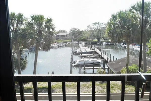 a view of a lake from a balcony