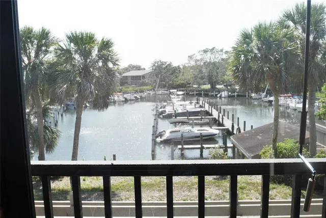 a view of a lake from a balcony