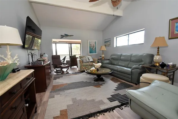 a living room with furniture and a window