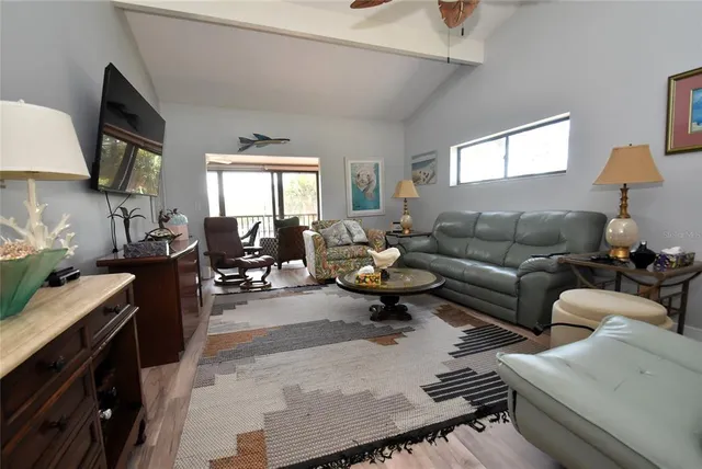 a living room with furniture and a window