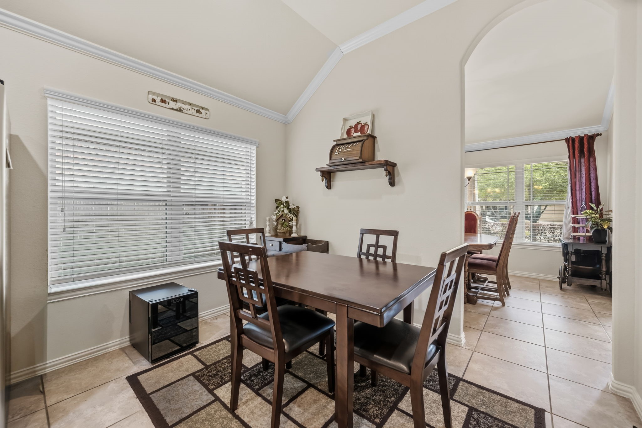 24118 McKinzie Ridge Drive Porter, TX 77365 - Photo 11 of 25 a view of a dining room with furniture and a window
