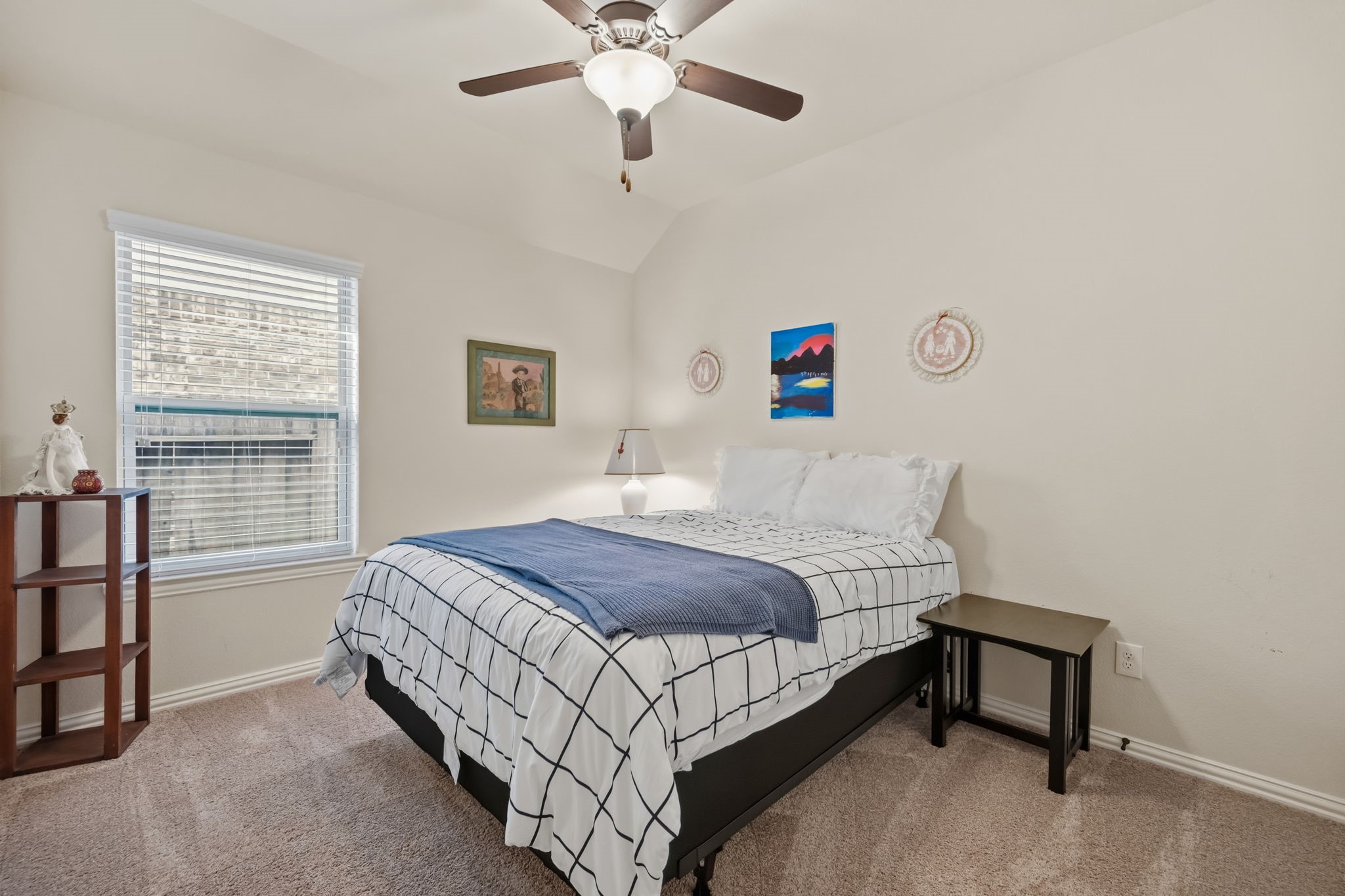 24118 McKinzie Ridge Drive Porter, TX 77365 - Photo 14 of 25 a bedroom with a bed and a window
