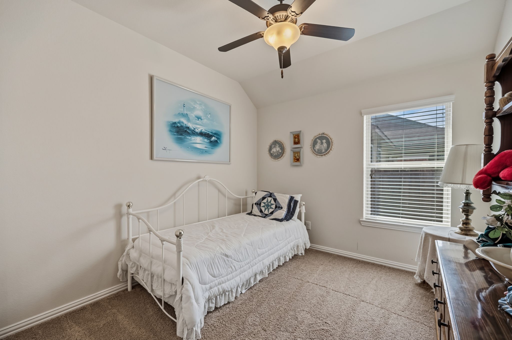 24118 McKinzie Ridge Drive Porter, TX 77365 - Photo 17 of 25 a spacious bedroom with a bed and a window
