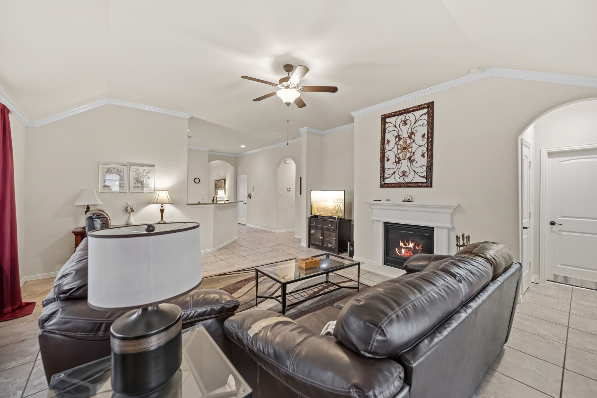 24118 McKinzie Ridge Drive Porter, TX 77365 - Photo 7 of 25 a living room with furniture and a fireplace