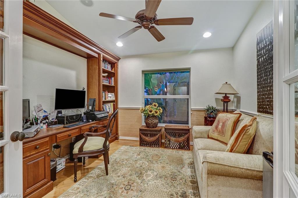 19731 Villa Rosa Loop Estero, FL 33967 - Photo 13 of 27 a living room with furniture and a flat screen tv