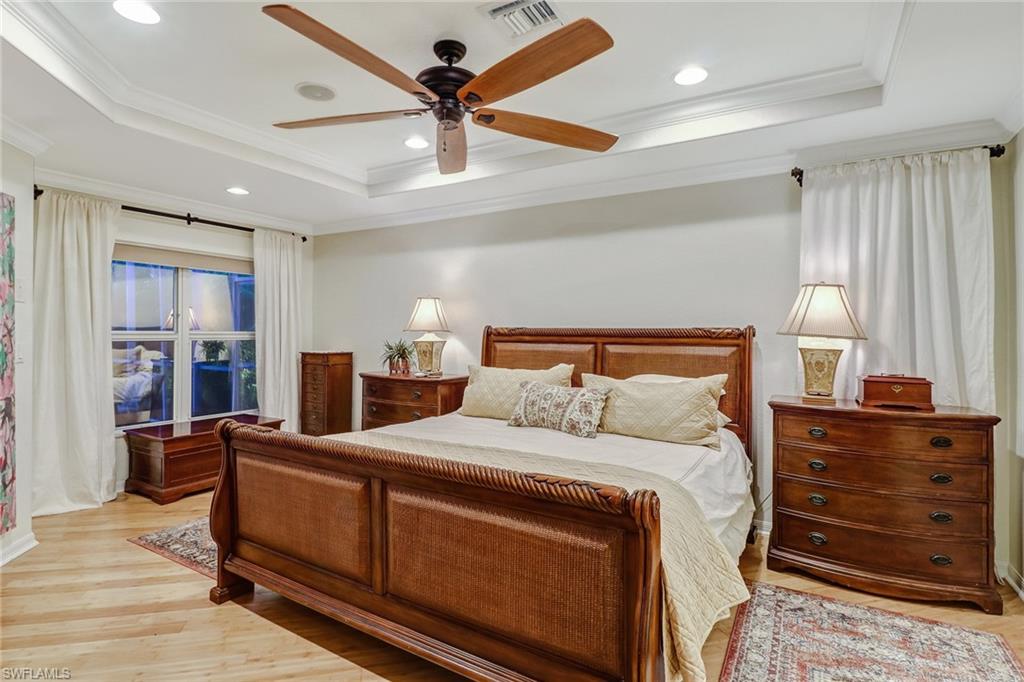 19731 Villa Rosa Loop Estero, FL 33967 - Photo 16 of 27 a bedroom with a bed and furniture