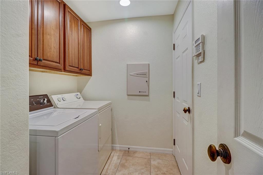 19731 Villa Rosa Loop Estero, FL 33967 - Photo 19 of 27 a utility room with dryer and washer
