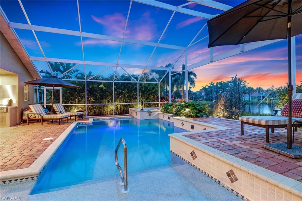 19731 Villa Rosa Loop Estero, FL 33967 - Photo 20 of 27 a view of a swimming pool with a patio