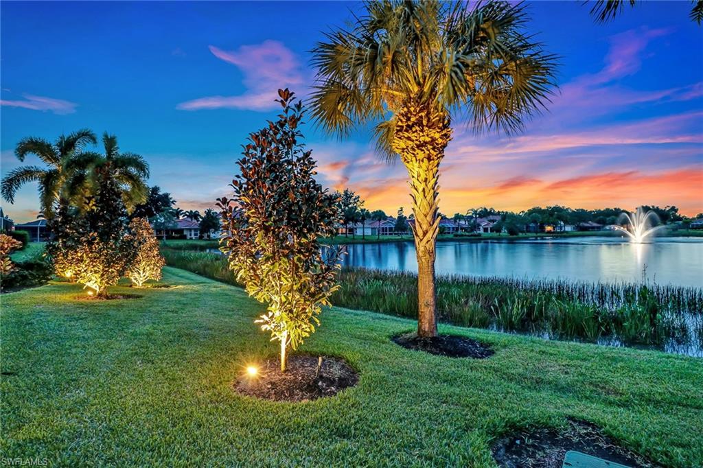 19731 Villa Rosa Loop Estero, FL 33967 - Photo 25 of 27 a backyard of a house with lots of green space