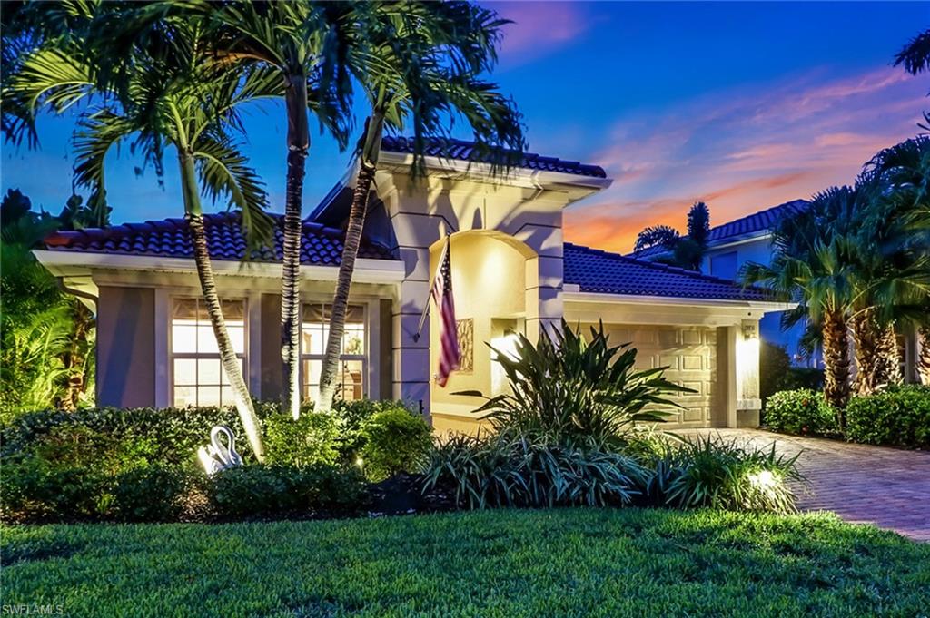 19731 Villa Rosa Loop Estero, FL 33967 - Photo 27 of 27 a front view of a house with garden