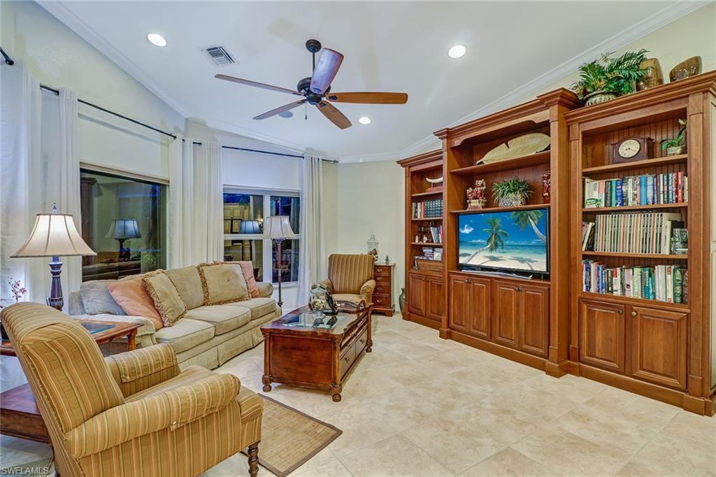 19731 Villa Rosa Loop Estero, FL 33967 - Photo 6 of 27 a living room with furniture a ceiling fan and a window